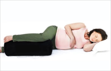 Pregnancy Back Pain – Pregnant Woman Lying on Side